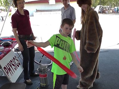 A boy with a balloon.