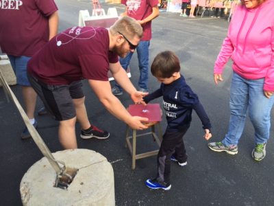 A student with a demo for a child.